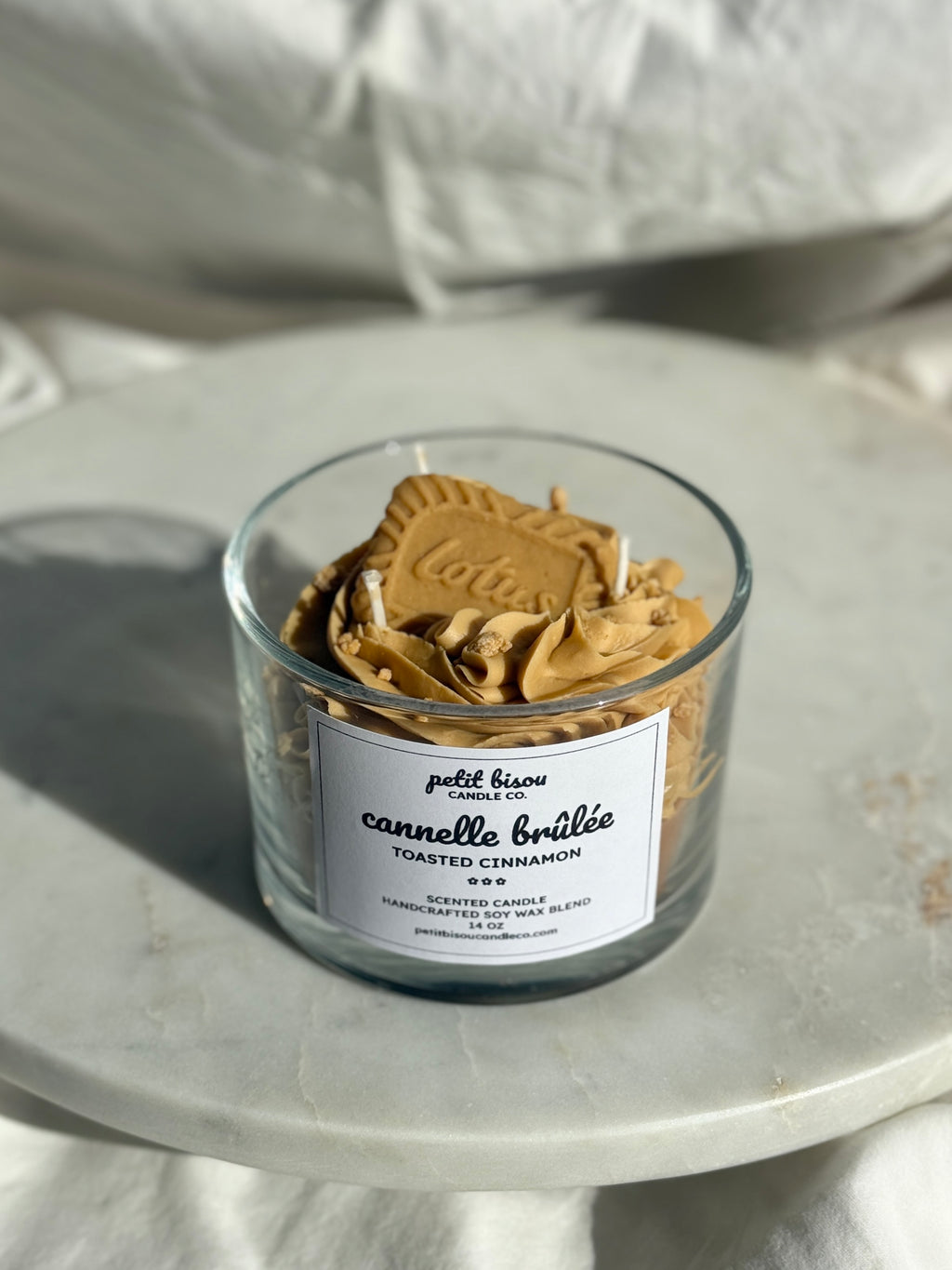 Front view of hand-poured cinnamon toast scented candle by Petit Bisou, dessert-inspired and handmade in New York