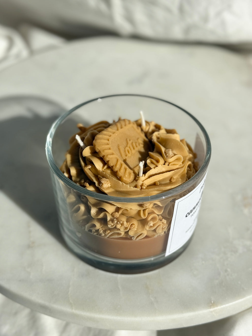 Top view of hand-poured cinnamon toast scented candle by Petit Bisou, dessert-inspired and handmade in New York