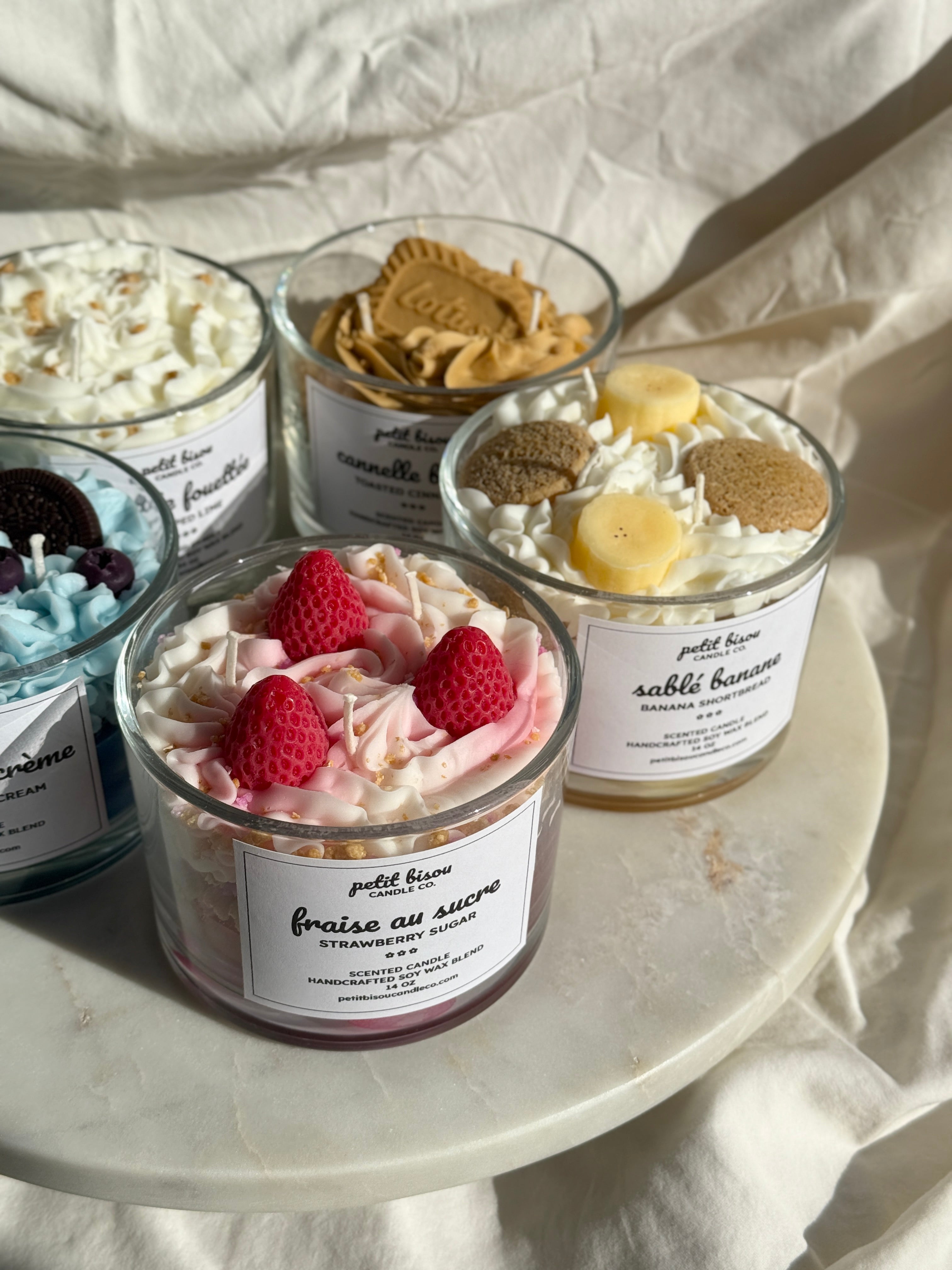 Group shot of hand-poured Strawberry shortcake scented candles by Petit Bisou, dessert-inspired and handmade in New York
